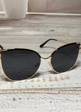 Окуляри жіночі сонцезахисні метелик із золотистими вставками чорні