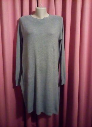 Туника с карманами и длинными разрезами