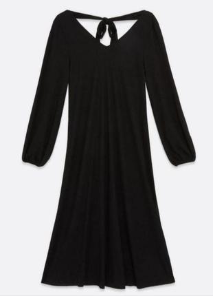 Уютное трикотажное платье длины миди с длинными рукавами и завязкой2 фото