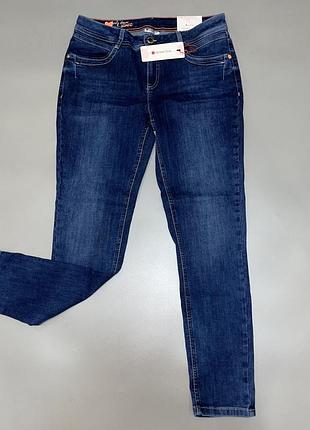 Джинси синього кольору, сток