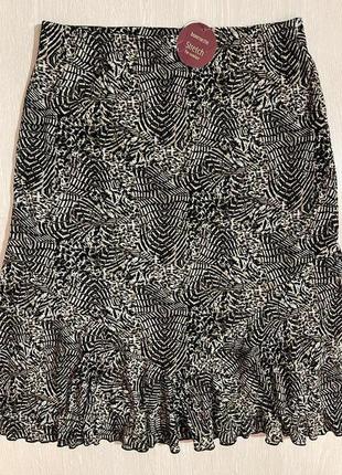 Очень красивая и стильная брендовая юбка-миди.2 фото