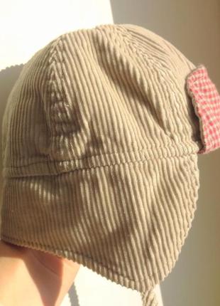 H&m. осенняя вельветовая шапка на завязках. 6-12 месяцев.1 фото