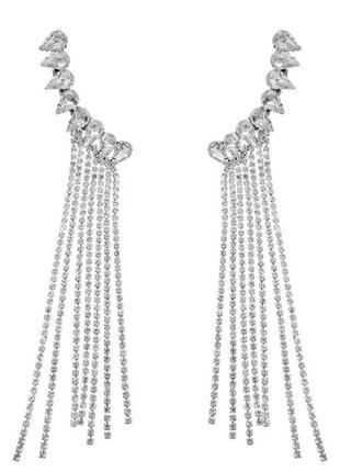 Модні довгі сережки-пензля зі стразами в срібному кольорі.8 фото