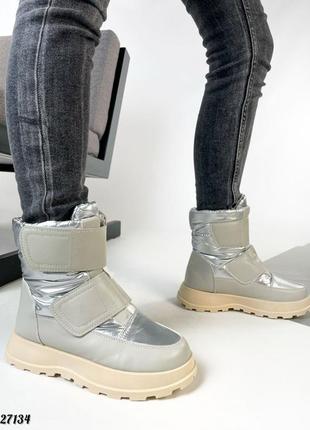 Зимові жіночі теплі та зручні мунбути черевики з хутром срібні сріблясті дутики зимні сапожки зима плащівка9 фото