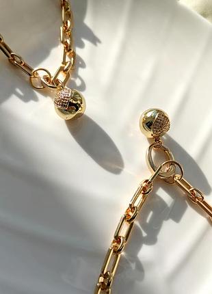 Комплект прикрас позолочений ланцюг та браслет з підвісками кулі з фіанітами