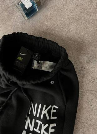 Чоловічі теплі чорні спортивні штани nike8 фото