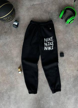 Чоловічі теплі чорні спортивні штани nike2 фото