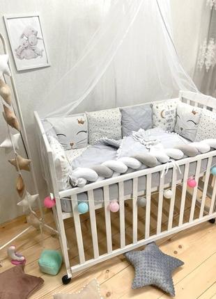 Комплект постели в детскую кроватку с бортиками подушками и косичкой2 фото