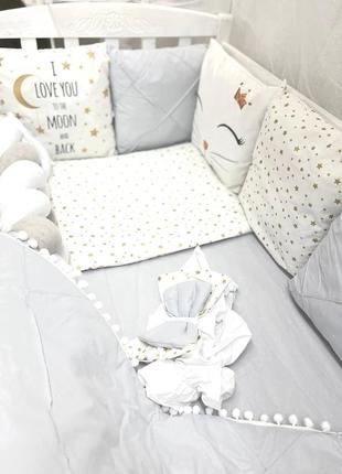 Комплект постели в детскую кроватку с бортиками подушками и косичкой6 фото