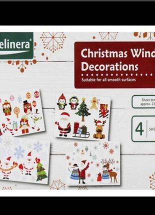Набор новогодних наклеек на окна melinera. 4 листа в наборе4 фото