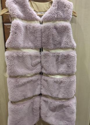 Меховая жилетка