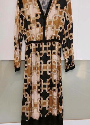 Дизайнерська сукня  h&m , сукню h&m колобароція richard allan6 фото