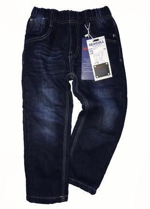 Тёплые модные джинсы мальчикам размер 104