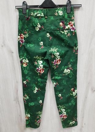Зеленые стречевые брюки в принт sale4 фото