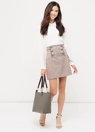 Красива стильна спідниця міні трапецією з жакарда
