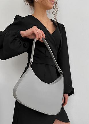 Клатч-багет з асиметрією сірий