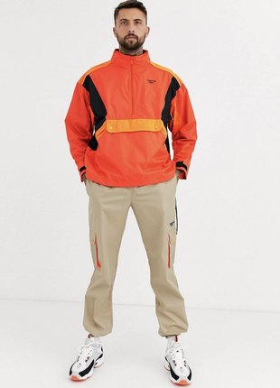 Яркая оранжевая кислотная панельная горная трейл куртка ветровка анорак reebok