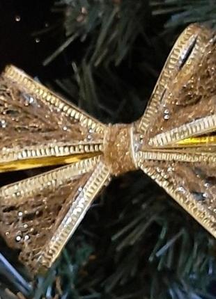 Бантик декоративний ручної роботи на гнучкому кріпленні золота павутинка2 фото