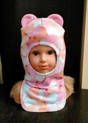 Двусторонняя трикотажная шапка-шлем.