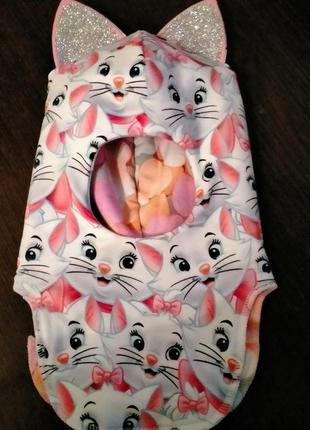 Двусторонняя трикотажная шапка-шлем.