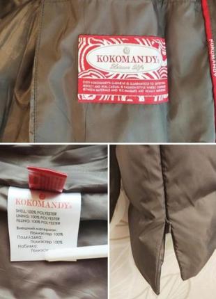 Гарний теплий подовжений якісний пуховик пальто бренду kakomandy