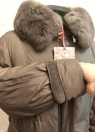 Гарний теплий подовжений якісний пуховик пальто бренду kakomandy