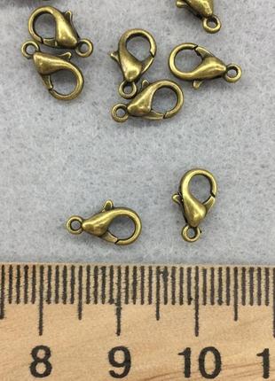 Замок 10мм 100шт цвет бронза