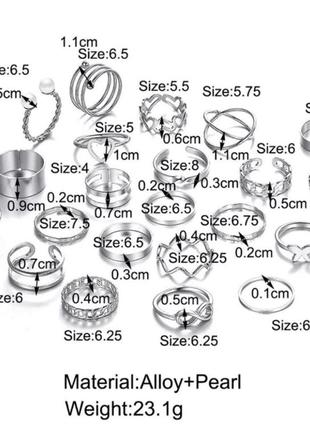 Кільця жіночі набір 22 штуки срібло.2 фото