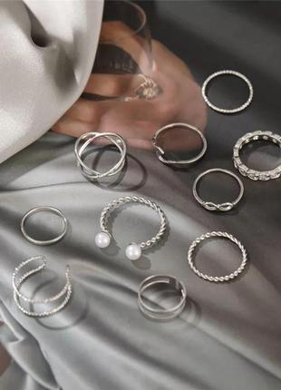 Кольца женские набор 9 штук серебро.2 фото