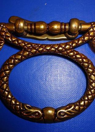 Ручка меблева вісімка