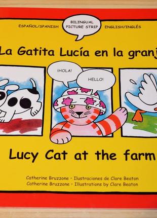 Lucy cat on the farm, детская книга на английском/испанском1 фото