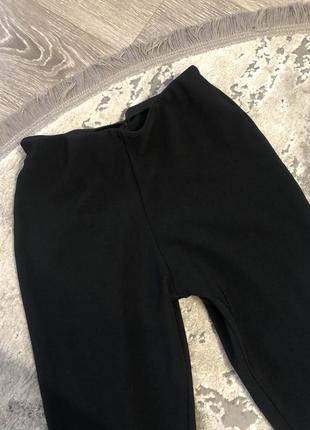 Черные брюки