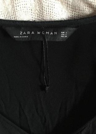 Ошатна  чорна подовжена блуза з плісерованими ярусами7 фото