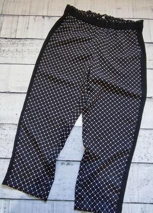 Чорні легкі брюки з принтом h&m2 фото