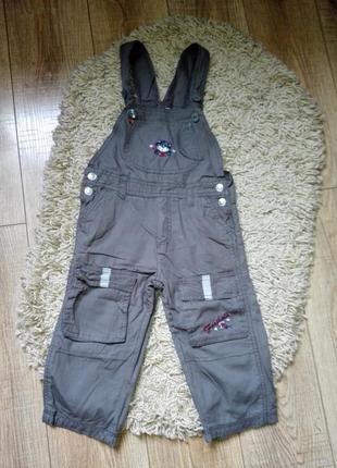 Фирменный комбинезон на малыша