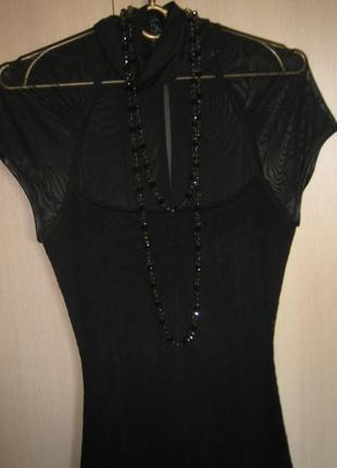 Черное вязаное платье с прозрачной вставкой2 фото