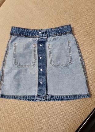 Джинсовая юбка трапеция с пуговицами спереди5 фото