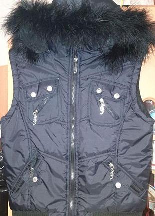 Женская жилетка с нат мехом