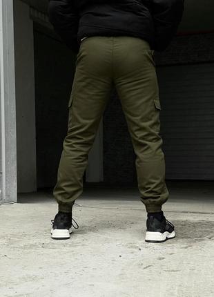 Теплі штани карго на флісі з кишенями хакі3 фото