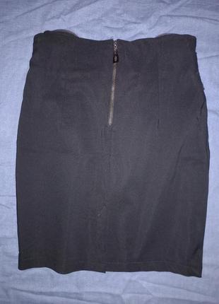 Классическая черная юбка с оригинальным передом8 фото
