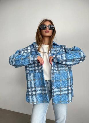 Клітчаста жіноча сорочка оригінального крою