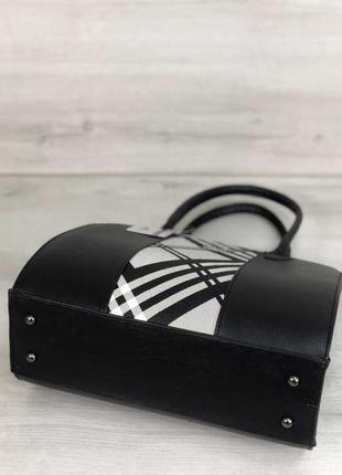 Женская сумка бочонок черного цвета со вставкой барбери2 фото