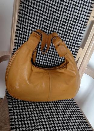Кожаная сумка.