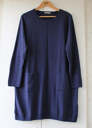 Тепле в'язане плаття з кишенями