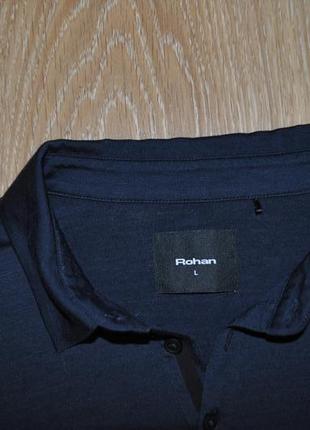 Темно синее поло из тонкой шерсти мерино бренда rohan5 фото