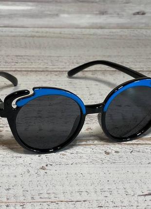 Детские очки солнцезащитные черные с синими вставками бабочка2 фото
