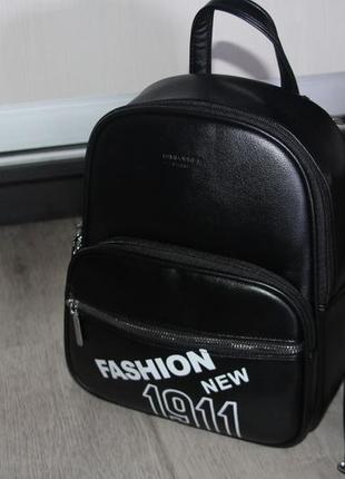 Стильный, красивый женский рюкзак можно носить как сумку.2 фото
