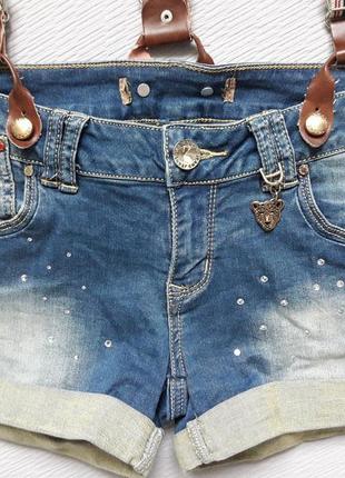 Суперовый стрейчевый джинсовый комбенизон со стразами и потёртостями3 фото