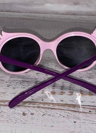 Дитячі окуляри рожеві сонцезахисні у вигляді мордочки кумедної мавпочки5 фото