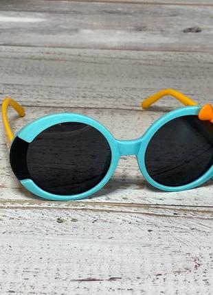Детские солнцезащитные очки голубого цвета с милым бантиком на оправе2 фото
